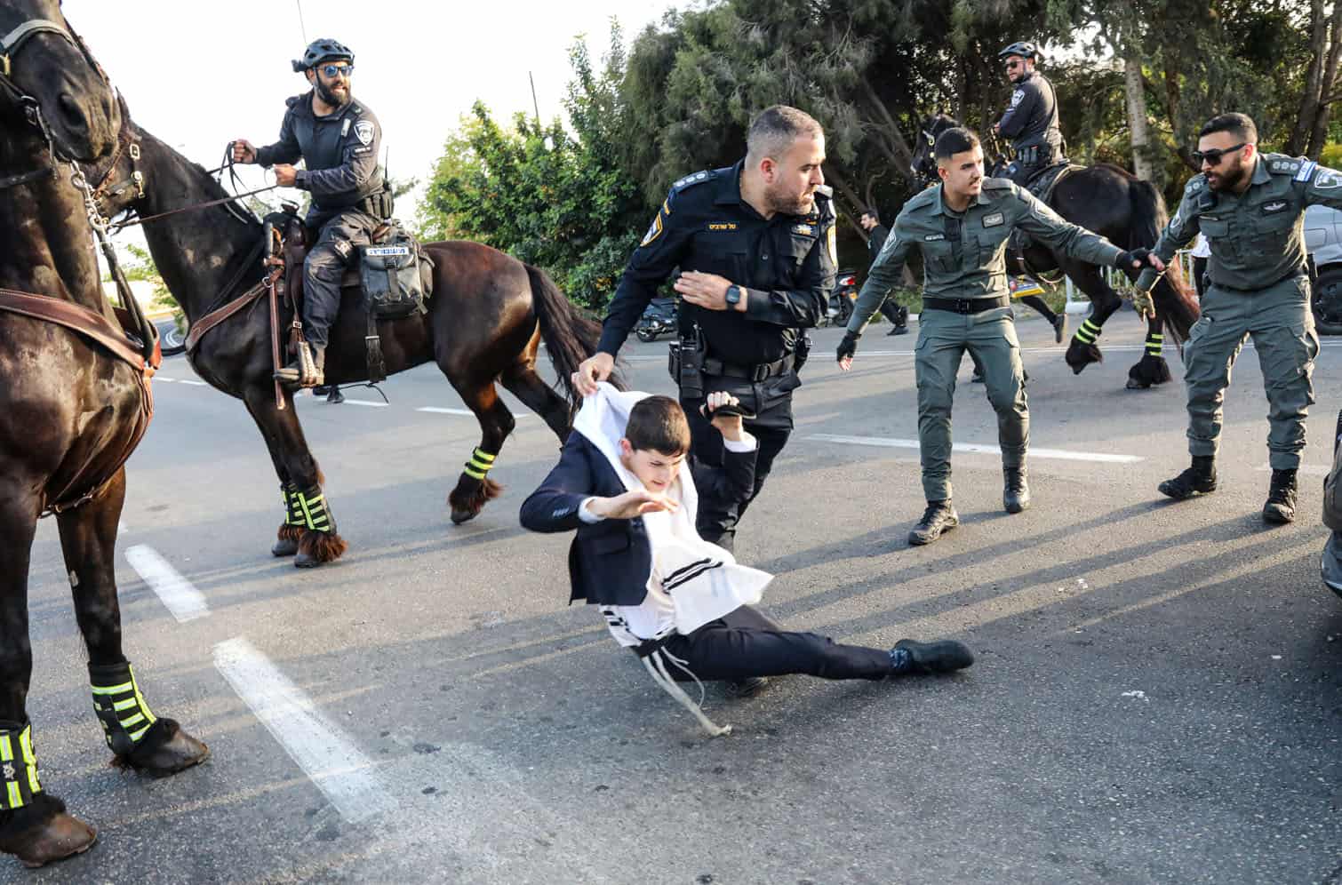 Ultra-Orthodox Jews rally against military conscription in Tel Aviv