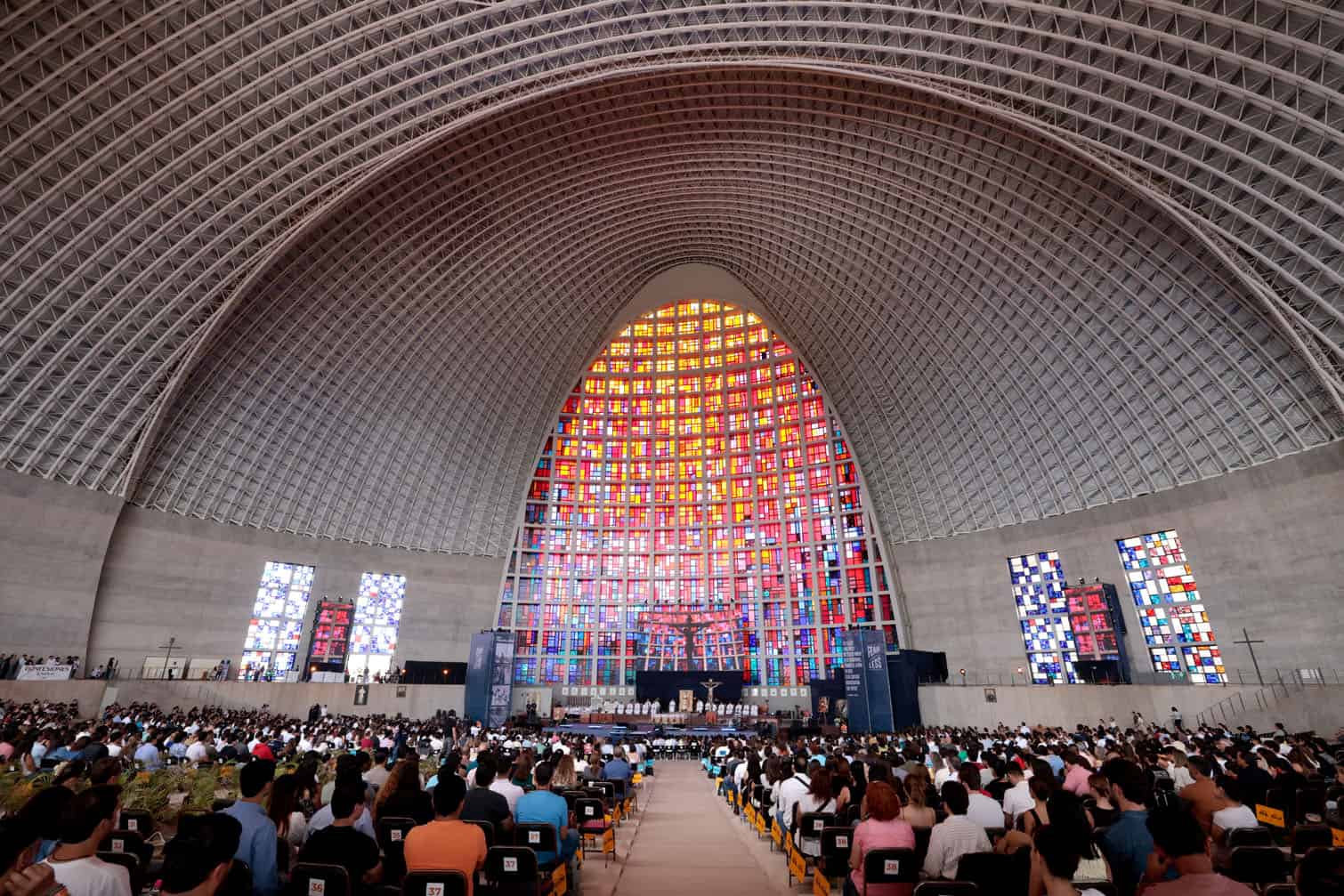 People attend a mass during the 2026 Fearless Congress