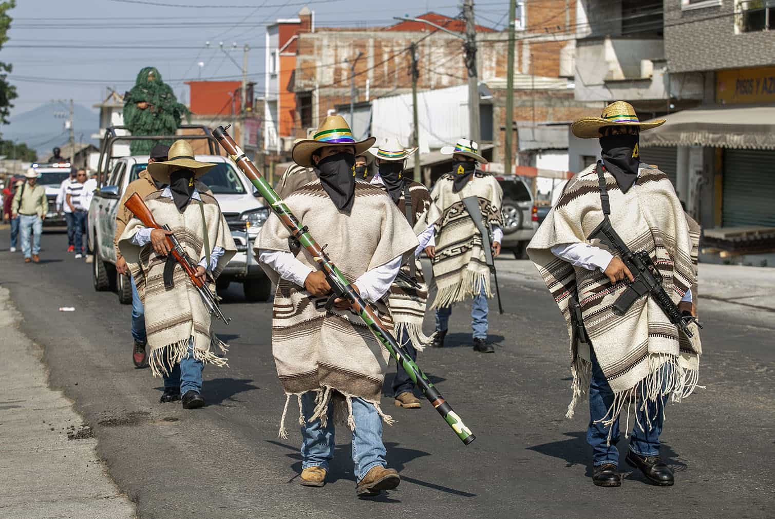 Members of the community security forces parade