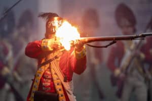 A reenactor dressed as a British soldier