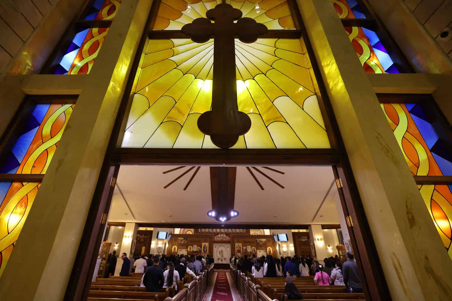 Christian worshippers attend a service at the Coptic Orthodox Patriarchate Church