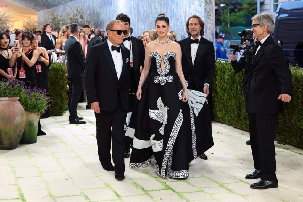 NEW YORK, NEW YORK - MAY 04: (L-R) Michael Kors and Anne Hathaway attend the 2026 Met Gala celebrating 