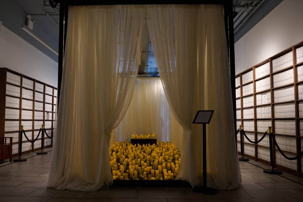 NEW YORK, NEW YORK - MAY 8: Hundreds of lit candles representing victims of sex trafficking are placed in the center of the main floor where the Institute for Primary Facts, a non-profit organization, opens a library archive of 3.5 million pages of the Epstein files that have been made available to the public at the Donald J. Trump and Jeffrey Epstein Memorial Reading Room in Tribeca on May 8, 2026 in New York City. People will be able to view the files from May 8 to 21, but access will be by appointment only. Edna Leshowitz/Getty Images/AFP Picture via / GETTY IMAGES NORTH AMERICA / Getty Images via AFP