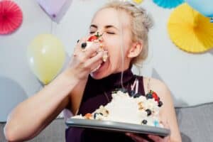 woman eating cake