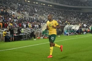 Percy Tau follows Njabulo Blom through exit door at Asian club