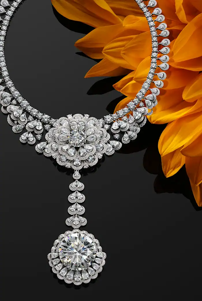 Art meets earth: This intricate floral-motif collar showcases the exceptional luminescence of D-flawless diamonds. Beyoncé famously wore a variation of this record-breaking $50 million suite to the 2026 Met Gala.