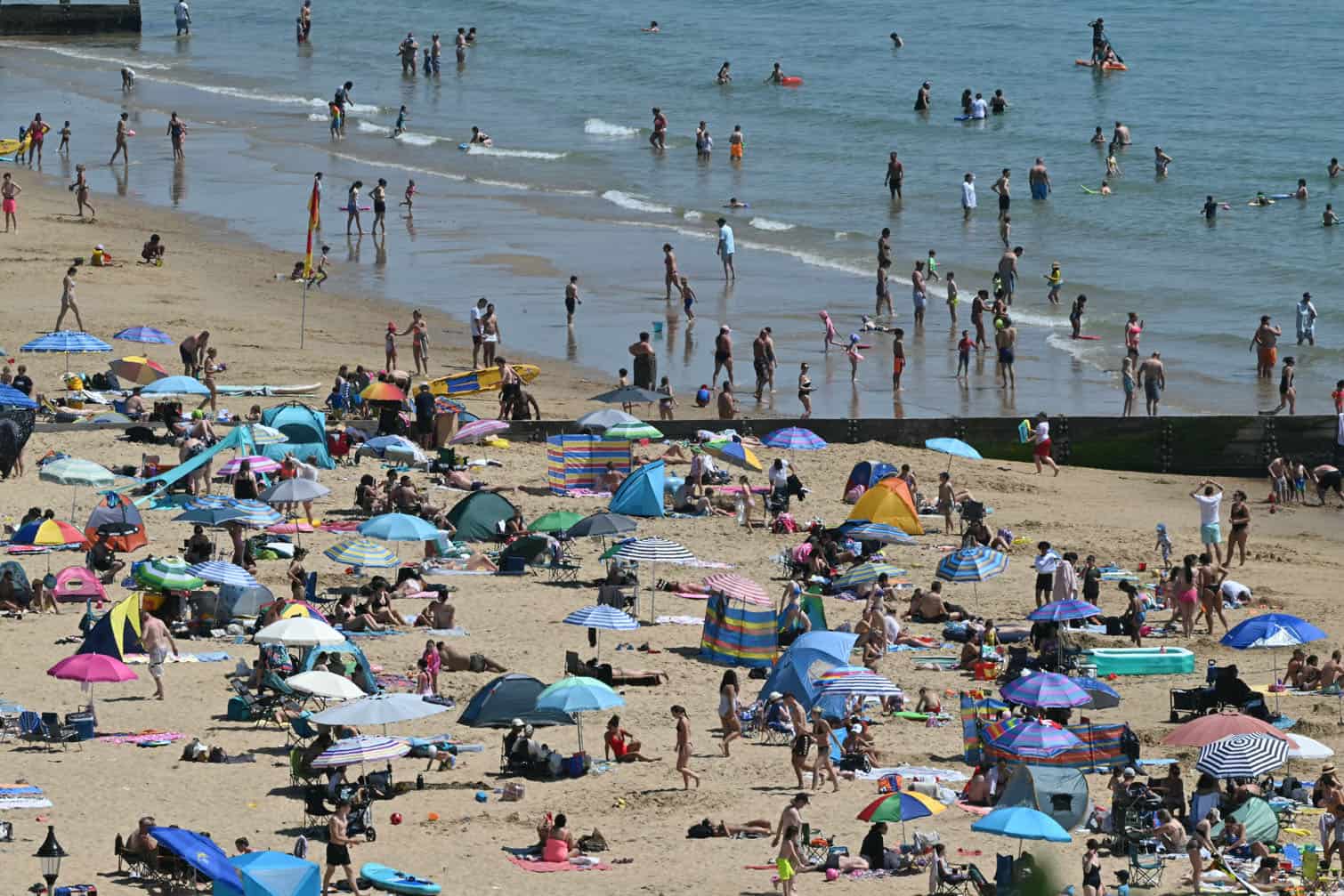 Sunbathers relax in the sunshine