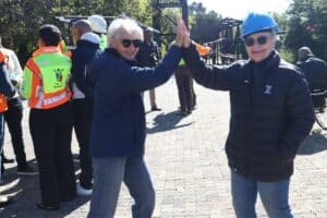 Ward 20 Clr Jill Humphreys and Ward 18 Ald Heather Hart celebrate the end of an illegal billboard.