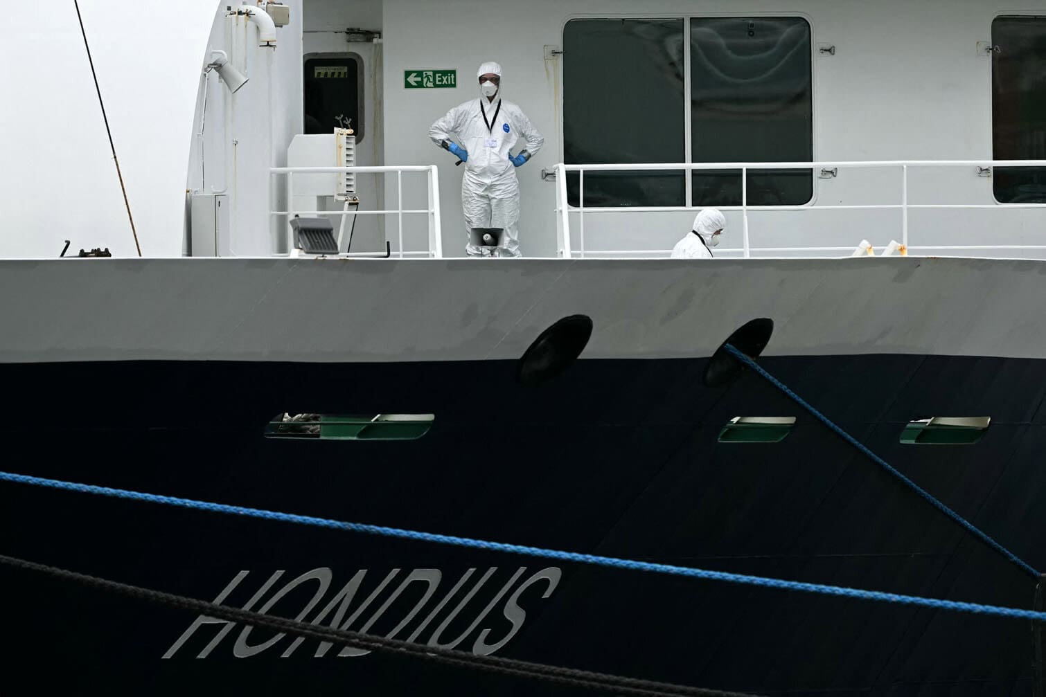 People wearing protective suits