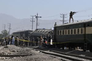 A Pakistani soldier aims his weapon