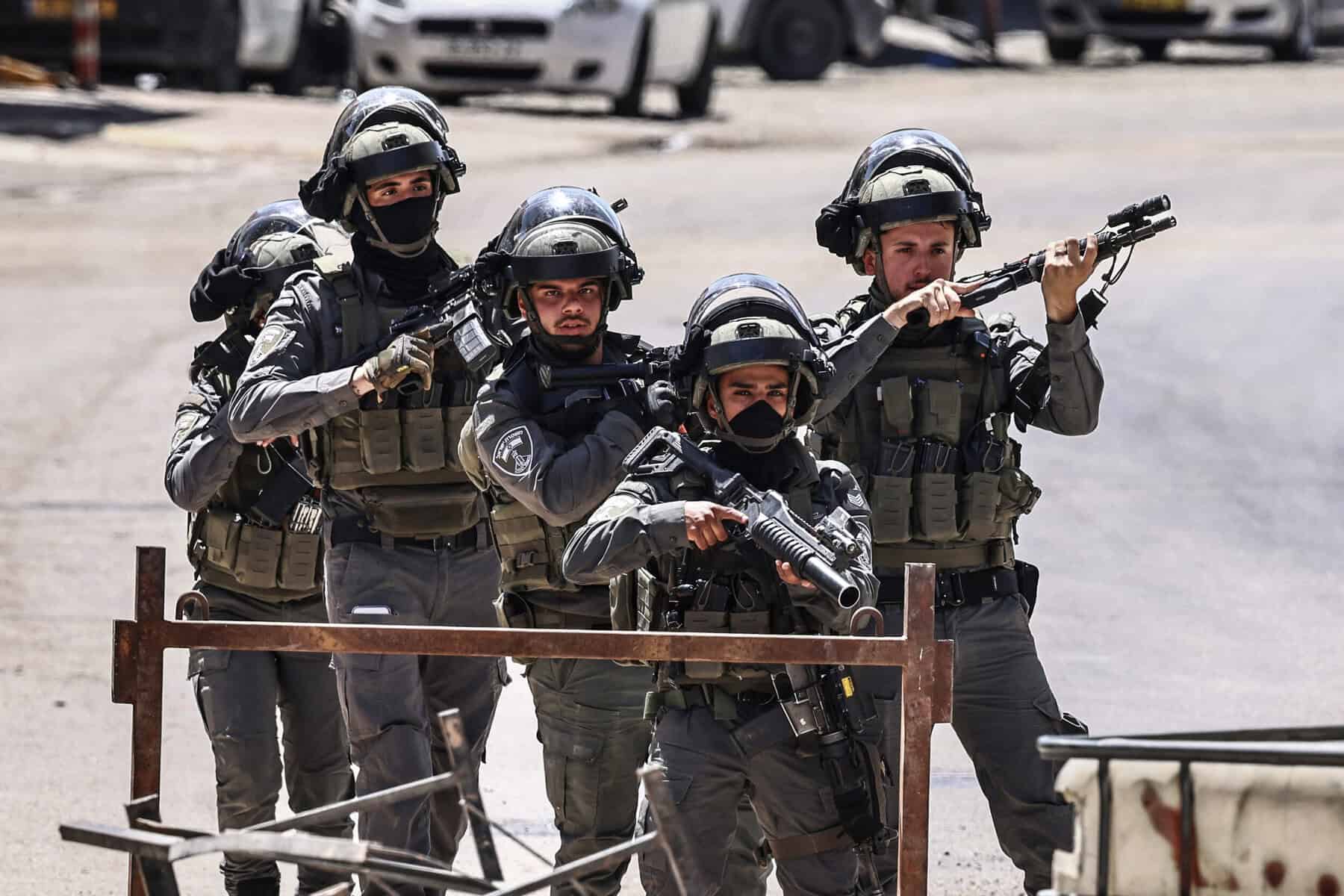 Israeli security forces patrol during a military raid