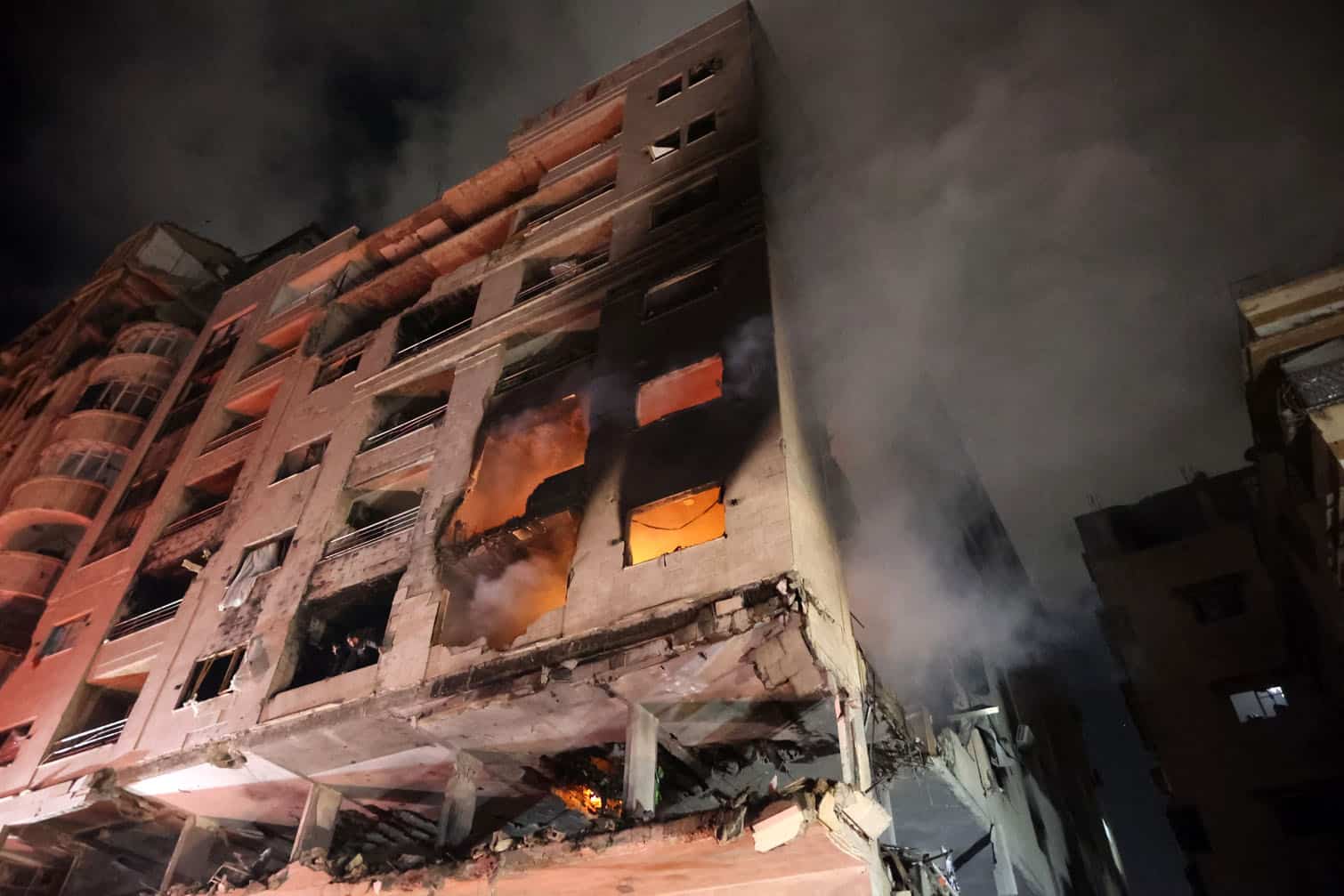 Fire breaks out in a residential building after an Israeli strike