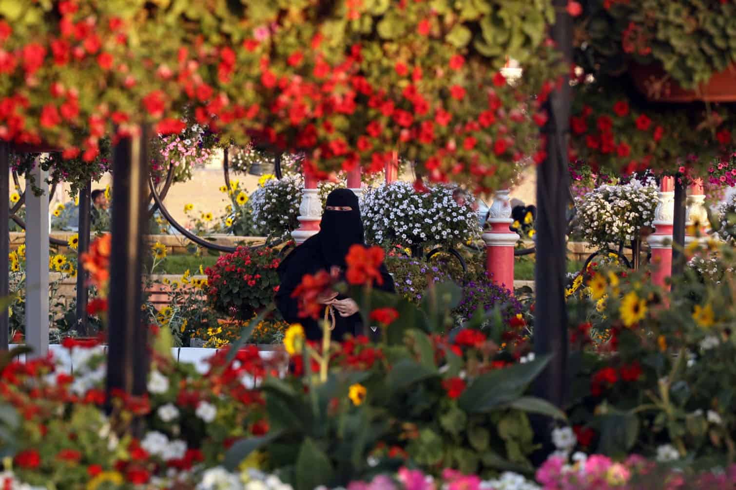 A woman visits the Boulevard Flowers Exhibition