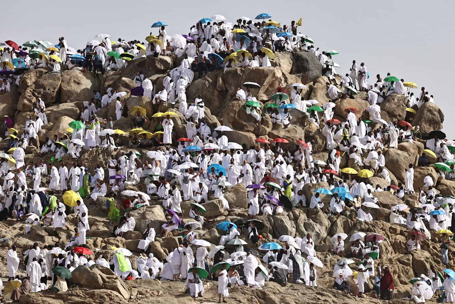 Muslim pilgrims pray on Saudi Arabia's Mount Arafat