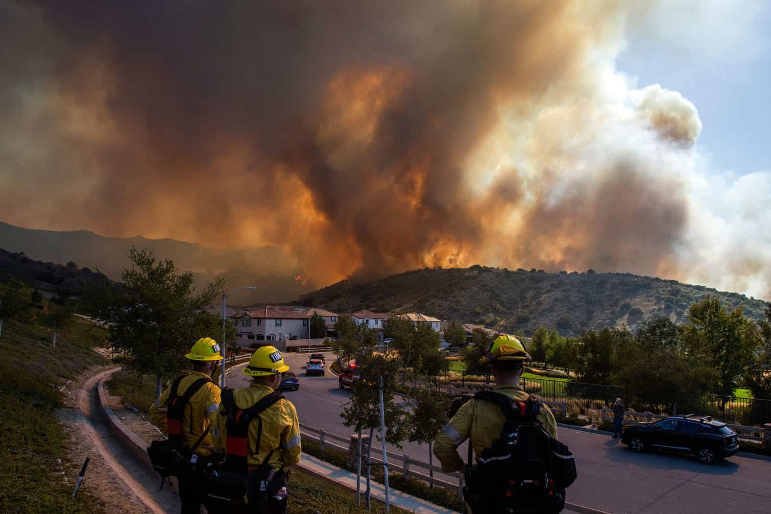 Fire fighters monitor the Sandy Fire
