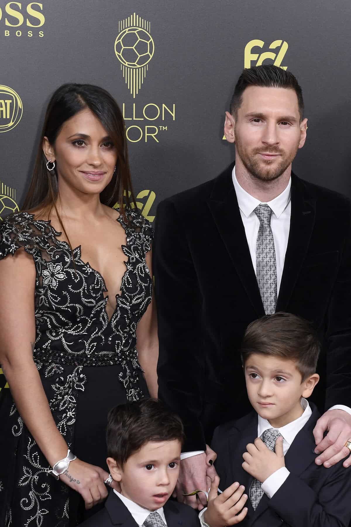 PARIS, FRANCE - DECEMBER 02: Lionel Messi (ARG / FC Barcelona) poses on the red carpet with his wife Antonella Roccuzzo and their kids during the Ballon D'Or Ceremony at Theatre Du Chatelet on December 02, 2019 in Paris, France. (Photo by Kristy Sparow/Getty Images)