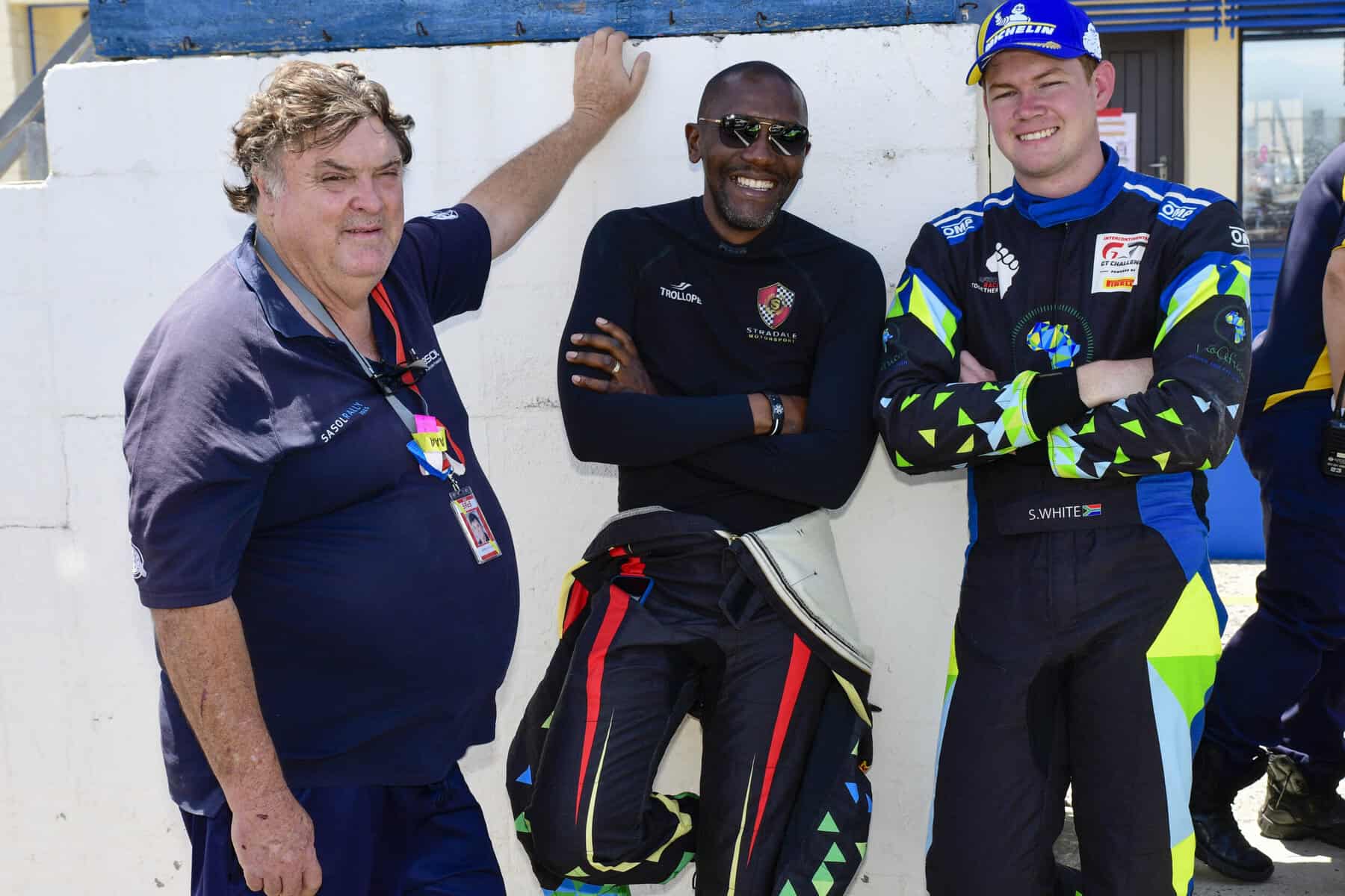 Motorsport drivers pose for a picture