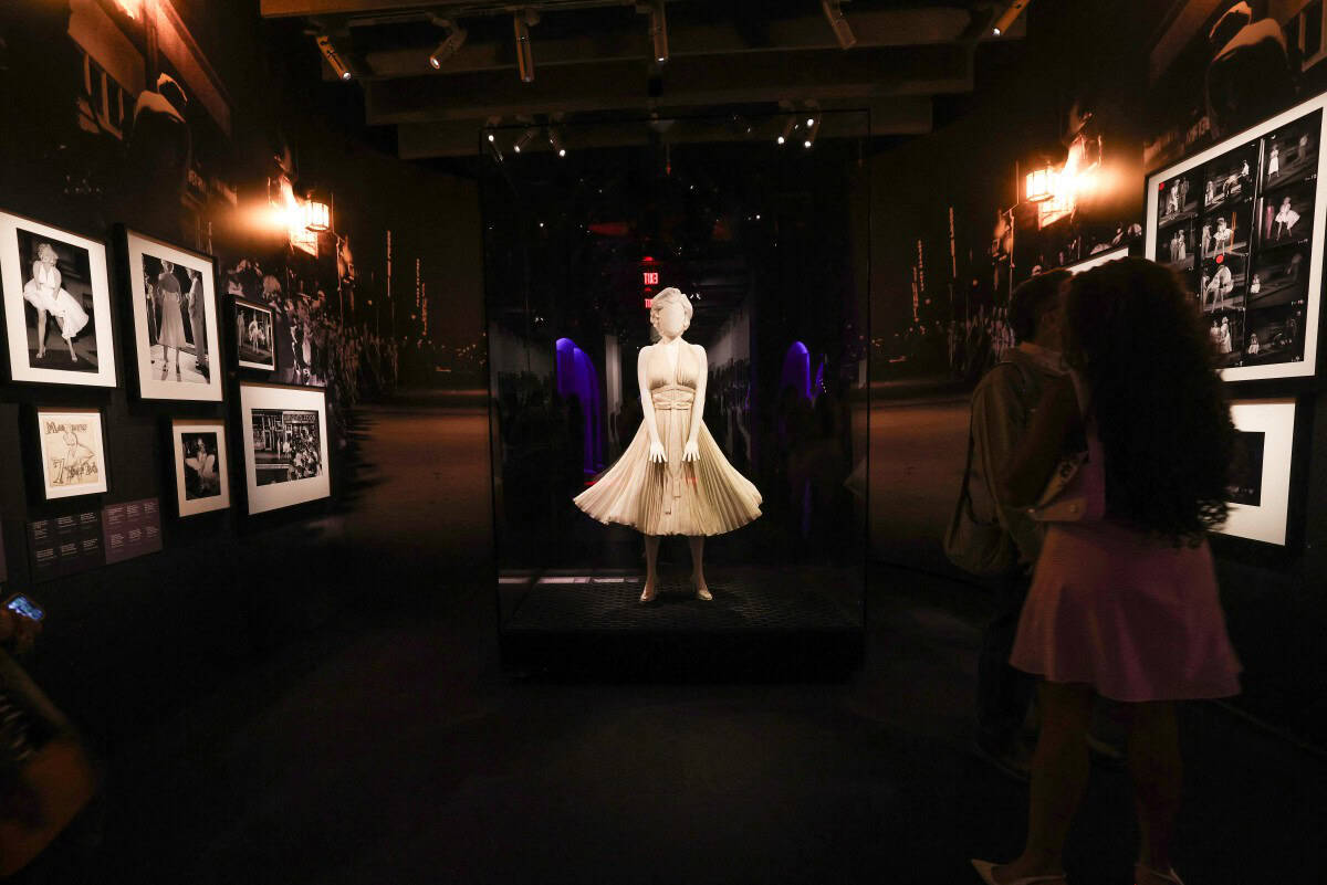 Dresses worn by Marilyn Monroe are displayed during the Exhibition Preview for