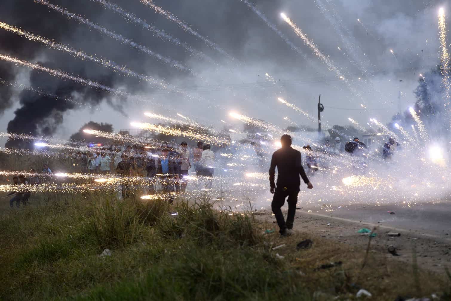 Anti-government demonstrators clash with police
