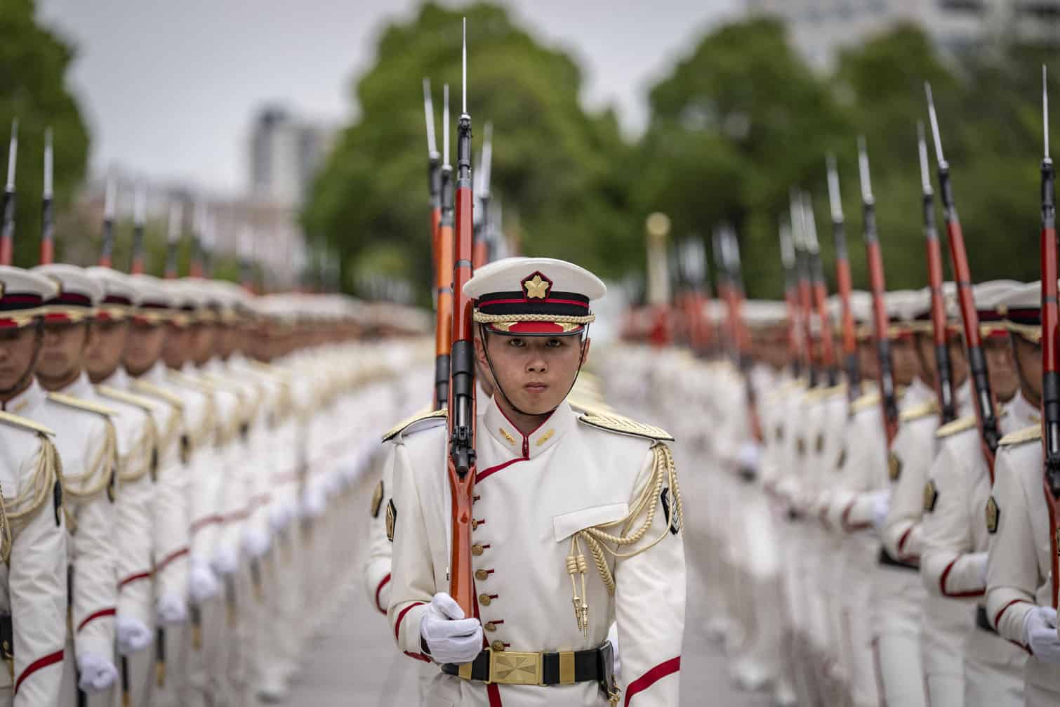 Members of an honour guard prepare