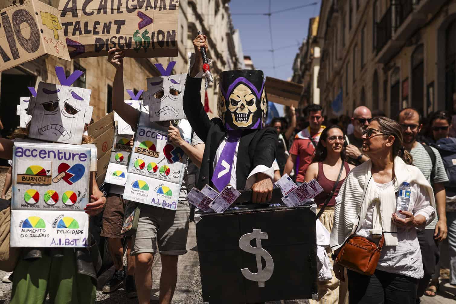 People take part in a demonstration in Lisbon