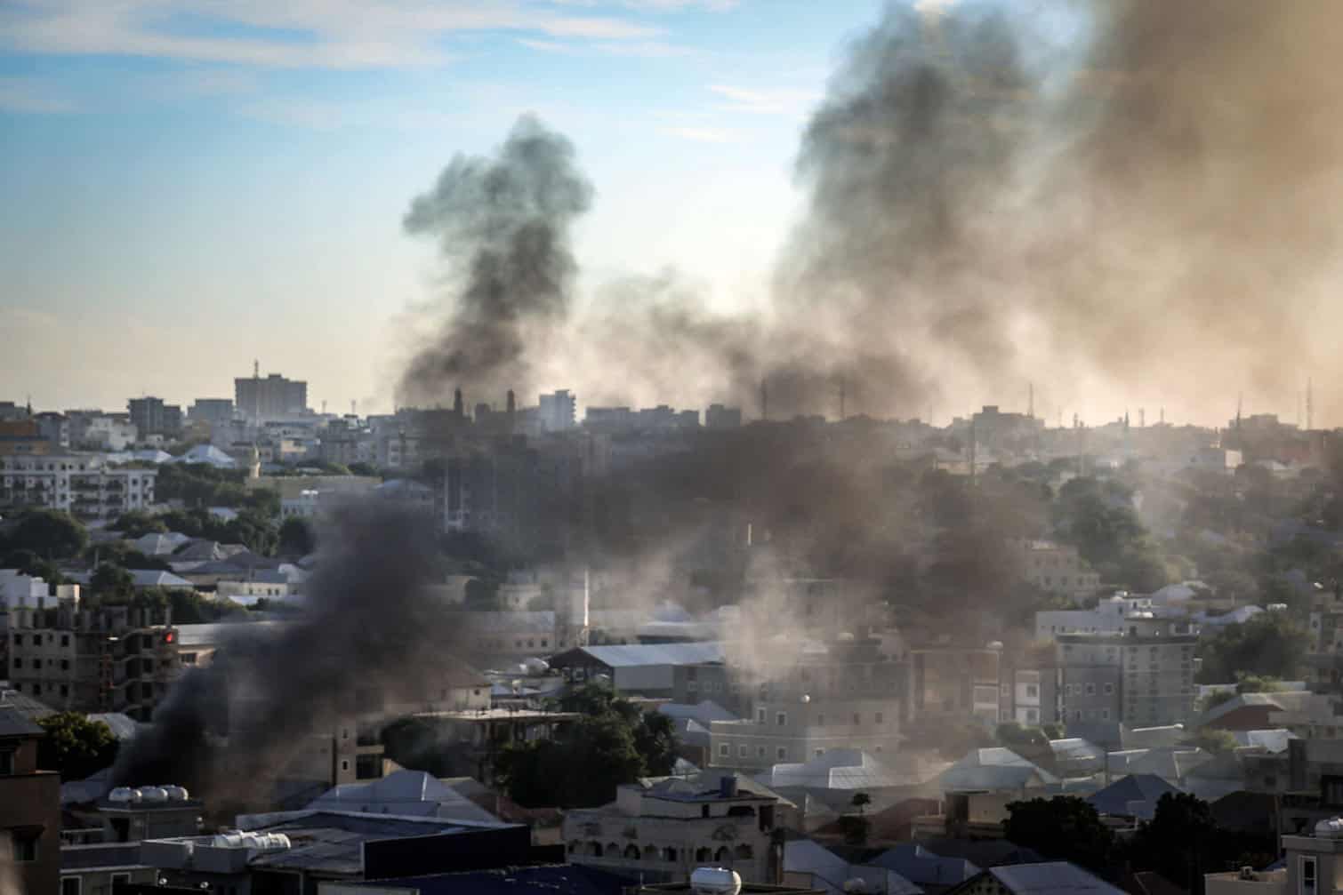 Smoke rises over a residential area