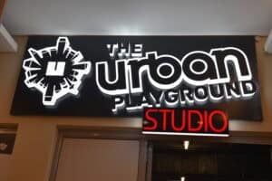 Signage outside the Urban Playground in Rosebank