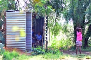 Did Gwarube lie about progress of eliminating pit toilets in schools?