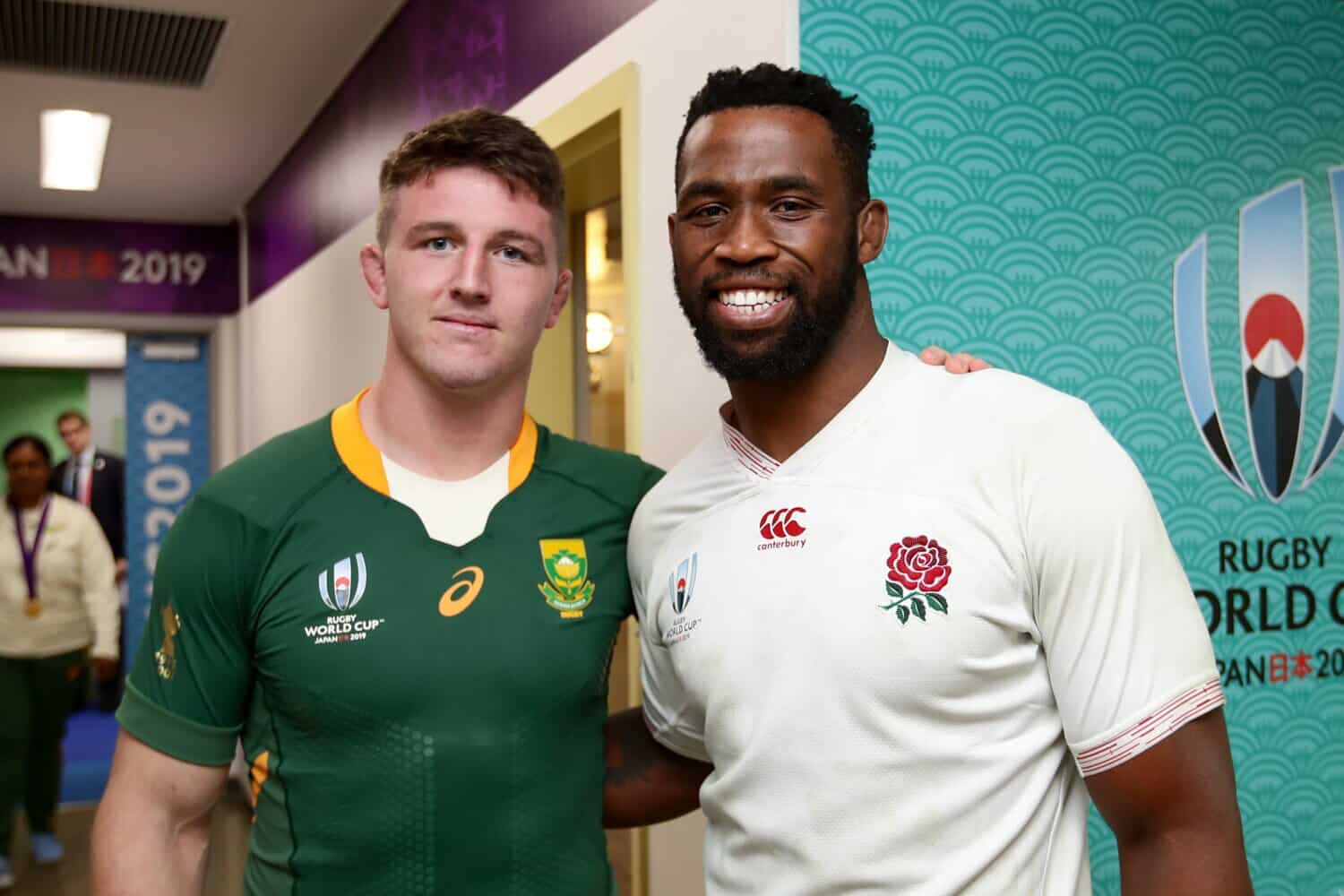 Siya Kolisi and Tom Curry
