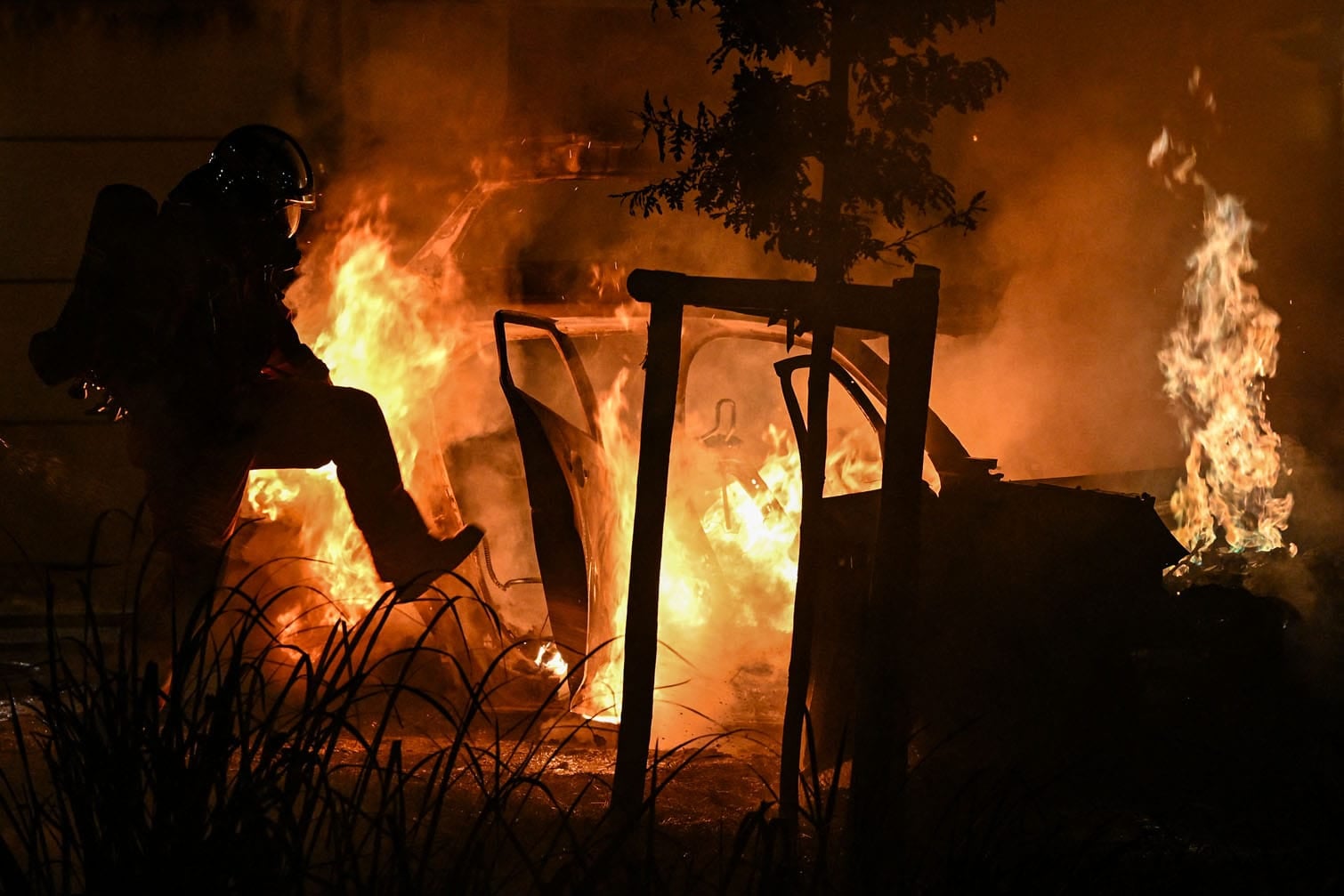 A firefighter sprays water