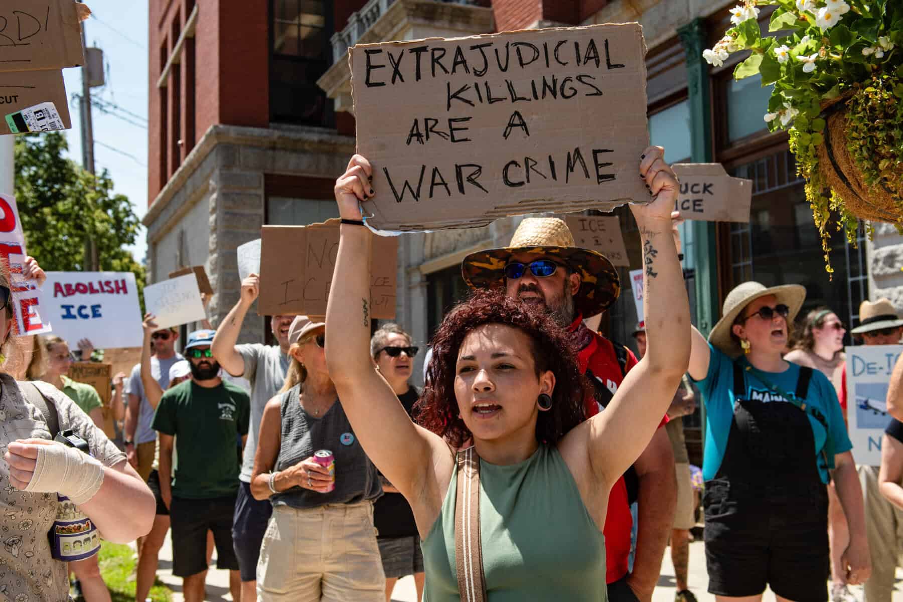 Demonstrators protest a federal law enforcement involved shooting