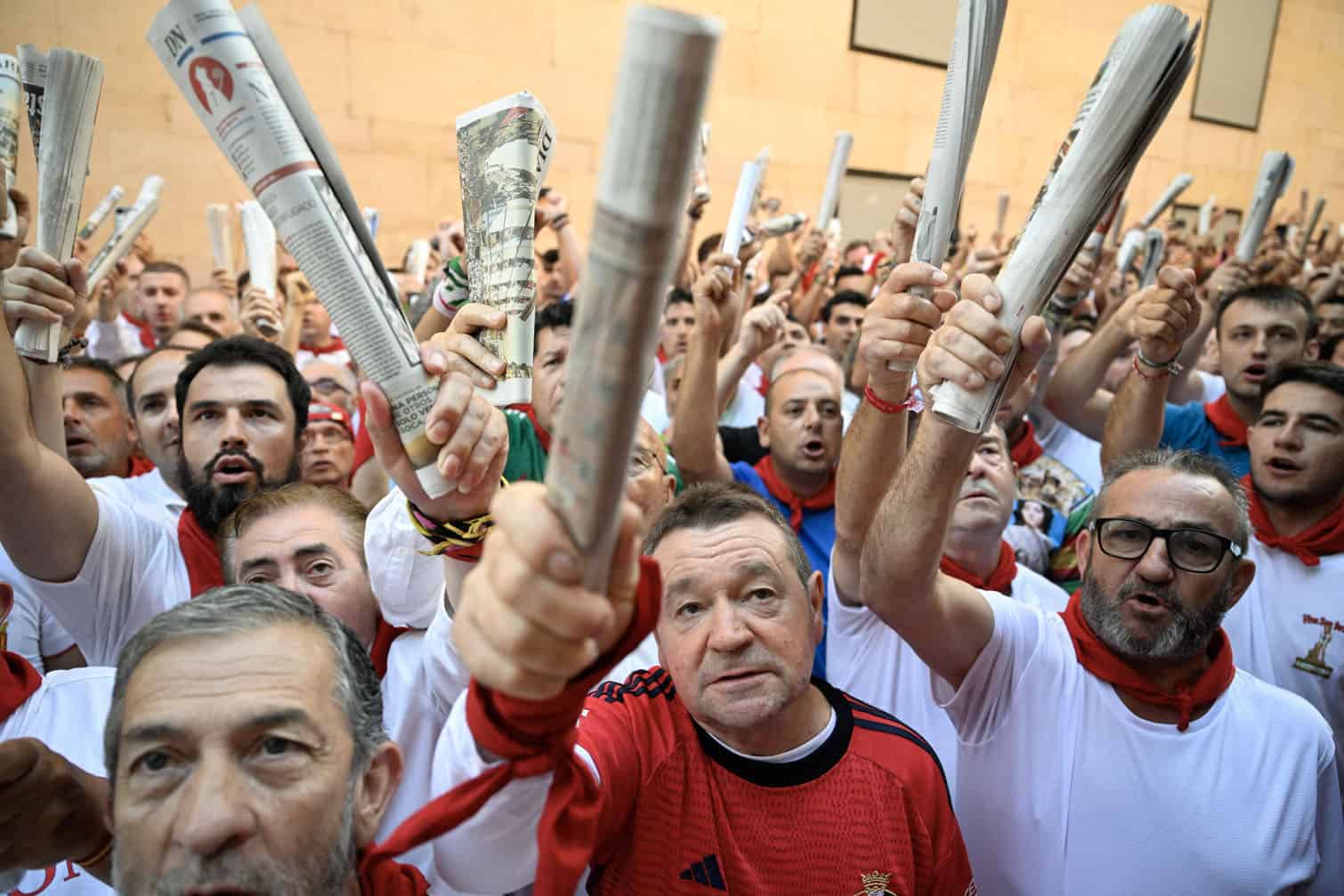 Bull runners sing a homily