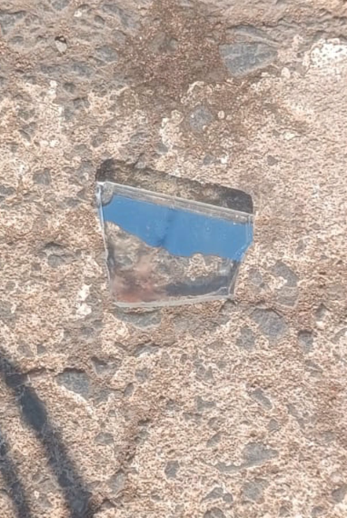 the piece of glass allegedly used during incident