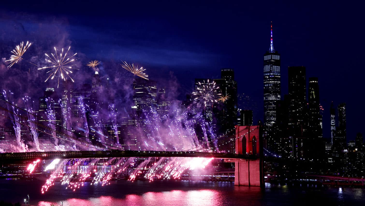 Fireworks light up the Brooklyn Bridge