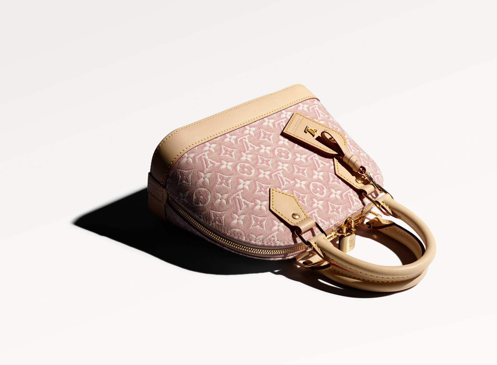 The 130-year-old LV monogram gets a new texture - And a ribbon-pink debut