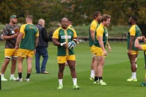 Bongi Mbonambi and teammates