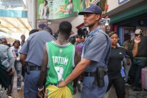 Immigration police accused of abusing legal migrants