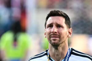 Messi says not certain to play "much longer" after father's death