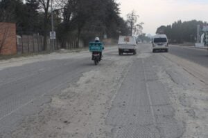 Unsurfaced section of Malibongwe Drive.
