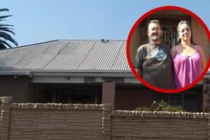 Frederik and Collette Morton in front of the house they've been trying to register on their names.