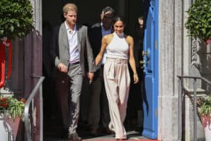 Prince Harry and family arrive back in Britain
