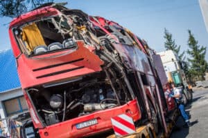 Hungarian Police officers inspect the wreckage of a Polish tourist bus