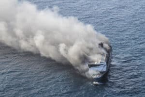 the passenger ship Mutiara Sentosa 2 catching fire