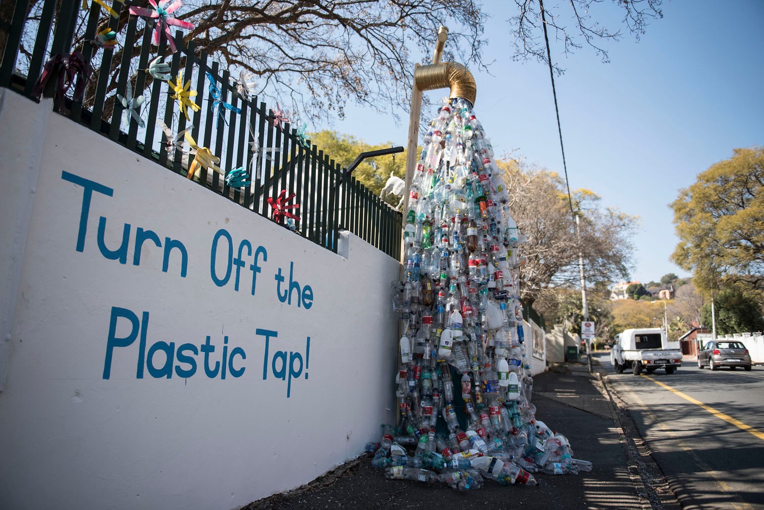 A sculpture of a tap pouring out plastic bottles decorates a wall outside Parkview Pre-Primary School with the message "Turn off the plastic tap", 4 August 2026. The school regularly creates murals and sculptures under different social and environmental themes with the help of its pupils, with the latest installation highlighting the impact of plastic pollution. More than 11 million tonnes of plastic are estimated to enter the world's oceans every year, according to the United Nations Environment Programme. Picture: Michel Bega/The Citizen