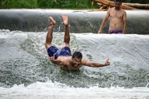 Asian workers enjoy cooling off from the summer heat