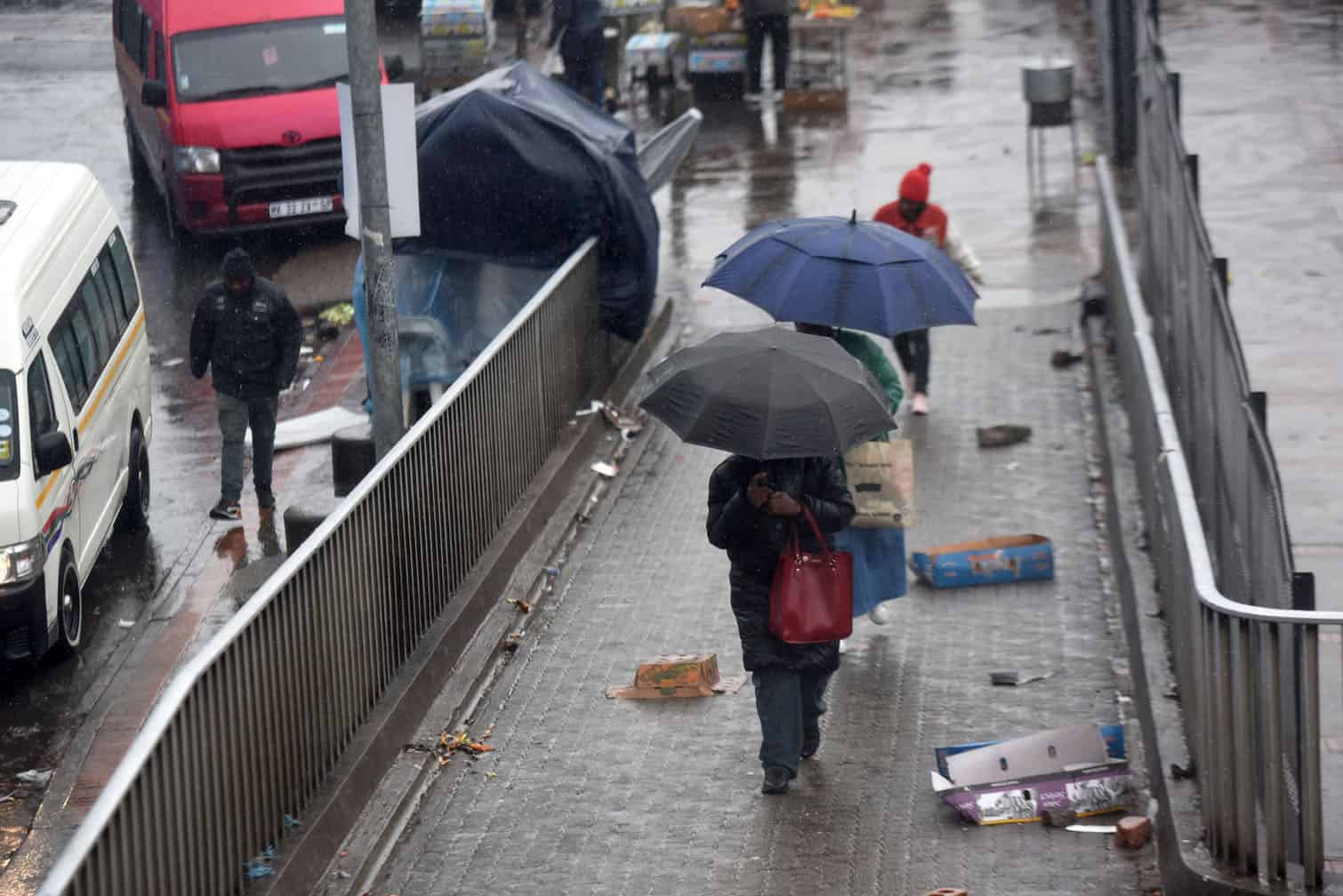 Sowetans brave the cold and rain at Bara Taxi Rank in Johannesburg on 11 August 2026. Johannesburg experienced cold, wet weather, with temperatures around 4°C and light rain, as severe cold fronts and disruptive weather warnings remained active across parts of the country. Picture: Nigel Sibanda / The Citizen