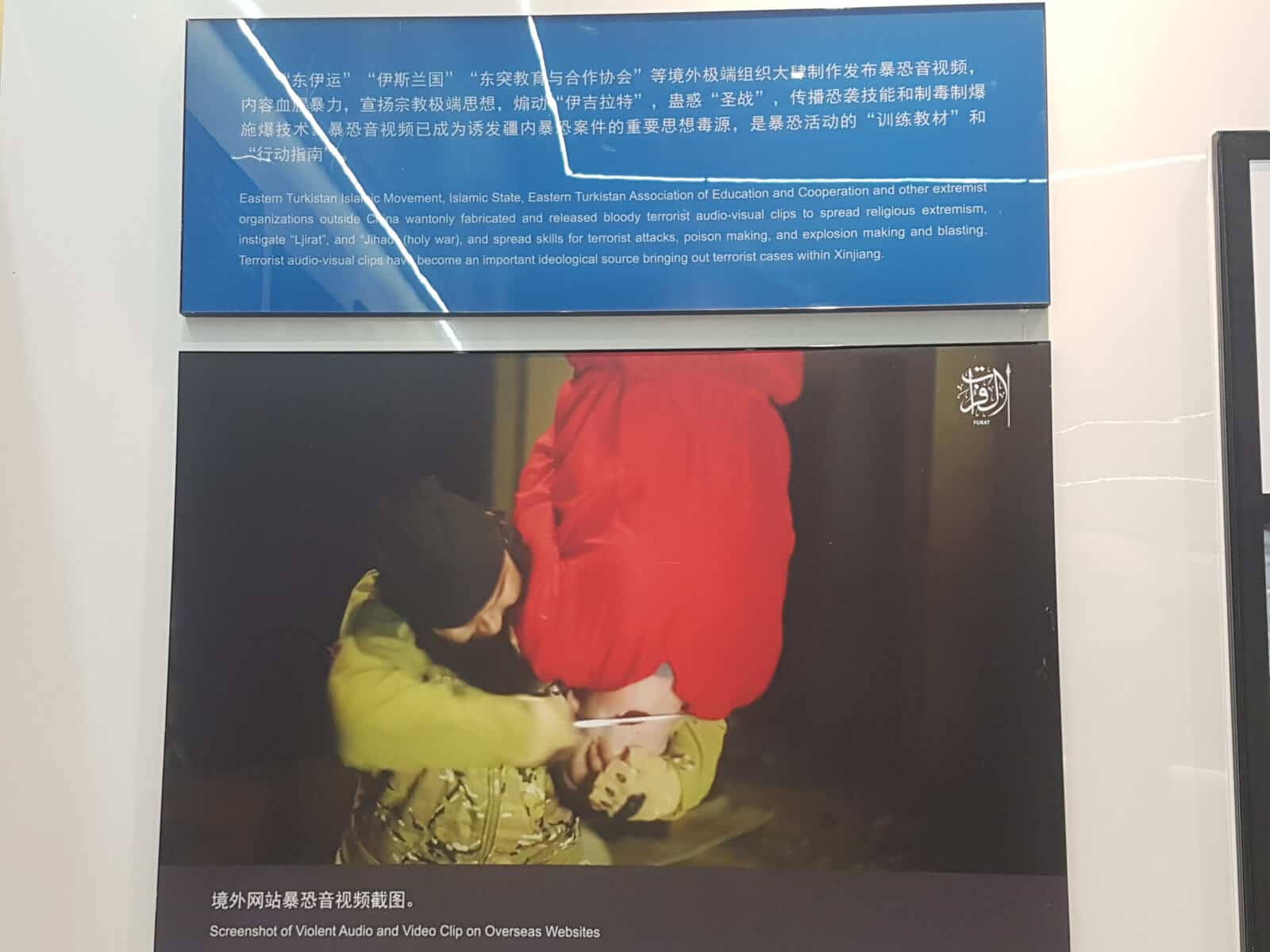 Xinjiang's museum on the fight against terror included a long video montage of graphic terror-related footage. Picture: Jarryd Westerdale