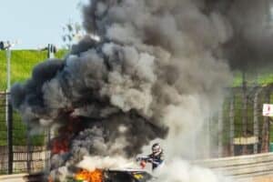 Dicing with death racing driver rescues rival from blazing Ferrari wreck