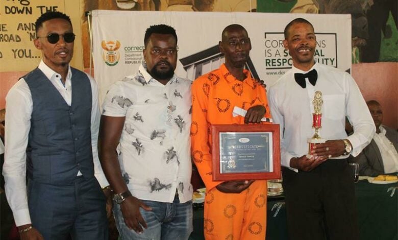 Congratulating Gerald Pandle is Themba Lukhele