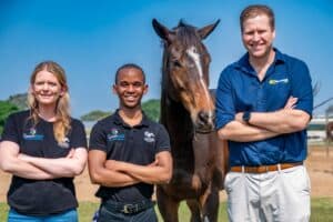 SA Jockey Academy chief operating officer Tarryn Mason, jockey apprentice Fezile Ngobese and Hollywood Foundation's Devin Heffer.